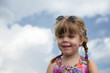 Photo: Portrait of a smiling little girl with braids Portrait of a smiling little girl with braids