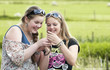 Photo: Two teens looking and laughing Two teens looking and laughing