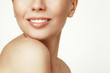 Photo: Close-up portrait of young woman with beautiful lips Close-up portrait of young woman with beautiful lips
