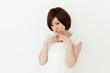Beautiful young woman relaxing in the room. Portrait of asian.