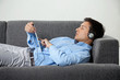 Photo: Relaxed Man Listening Music On Digital Tablet Relaxed Man Listening Music On Digital Tablet