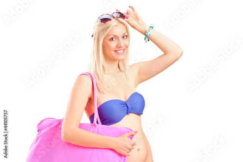 Photo: Attractive blond woman in swimsuit posing Attractive blond woman in swimsuit posing