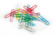 A pile of paperclips on a white background