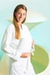 Foto: Wellness - young woman floating in Spa in Tank Wellness - young woman floating in Spa in Tank