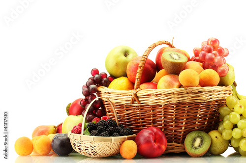 Foto: Assortment of exotic fruits and berries in baskets isolated Assortment of exotic fruits and berries in baskets isolated