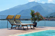 Two sundeds against Como lake, Italy