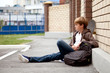 Photo: School teen with scholbag and skateboard School teen with scholbag and skateboard