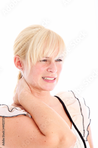 Photo: Woman rubbing her stiff neck Woman rubbing her stiff neck