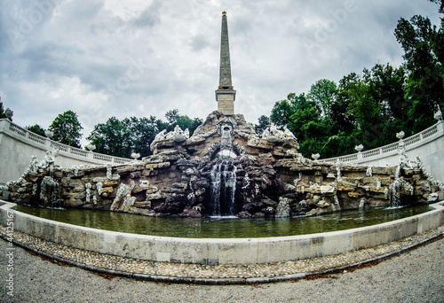 Photo: Old fountain in park of Schonbrunn Palace in Vienna. Austria Old fountain in park of Schonbrunn Palace in Vienna. Austria