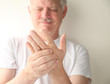 senior with numb hand