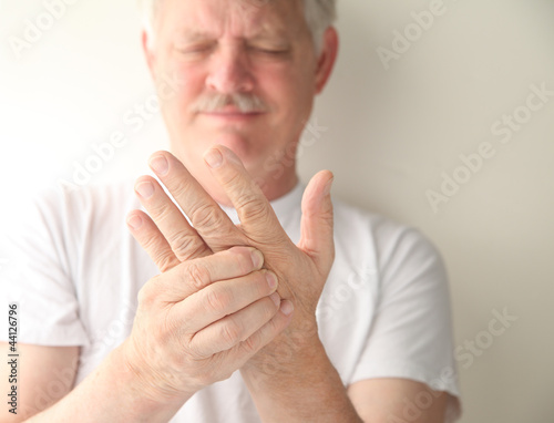 Photo: senior with numb hand senior with numb hand