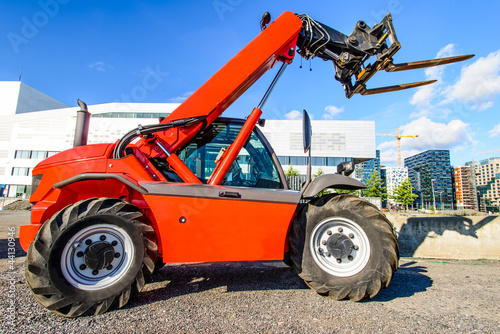 Photo: red skid steer red skid steer