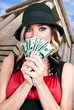 Woman Holding 100 Dollar Bills