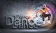 Photo: young man dancing hip hop with color lines young man dancing hip hop with color lines