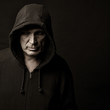 Portrait of the man in a hood