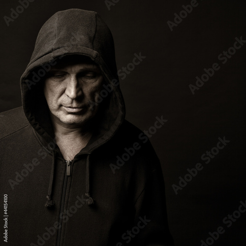 Photo: Portrait of the man in a hood Portrait of the man in a hood