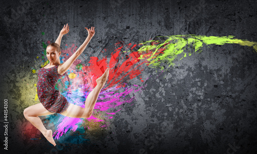 Photo: Girl in color dress dancing.Collage Girl in color dress dancing.Collage
