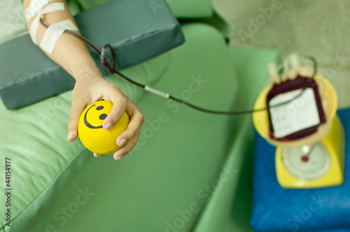 Photo: a donor donates blood at hemotransfusion station a donor donates blood at hemotransfusion station