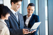 group of business people using laptop