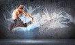 Photo: young man dancing hip hop with color lines young man dancing hip hop with color lines