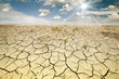 Land with dry and cracked ground. Desert