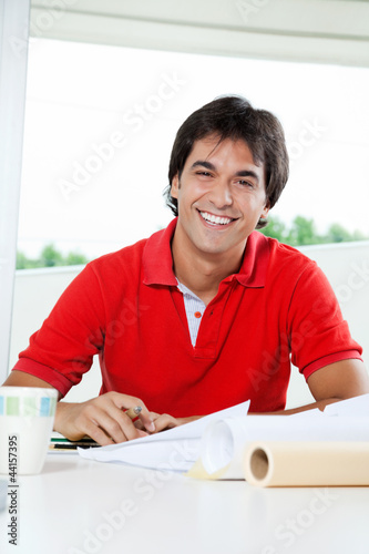Photo: Happy Architect Working From Home Happy Architect Working From Home