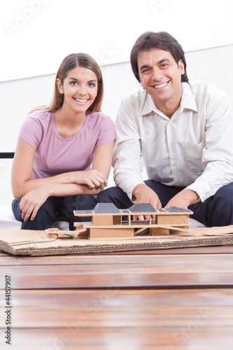 Photo: Two Architects with House Model Two Architects with House Model