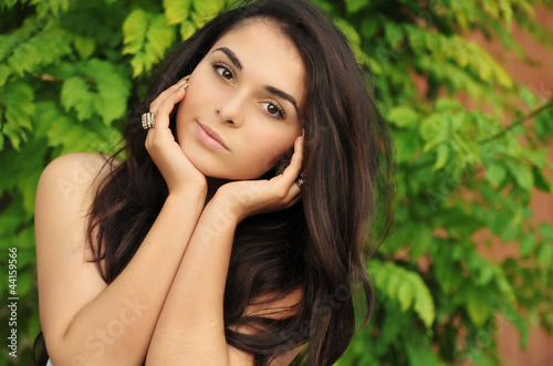 Photo: Portrait of young beautiful woman Portrait of young beautiful woman