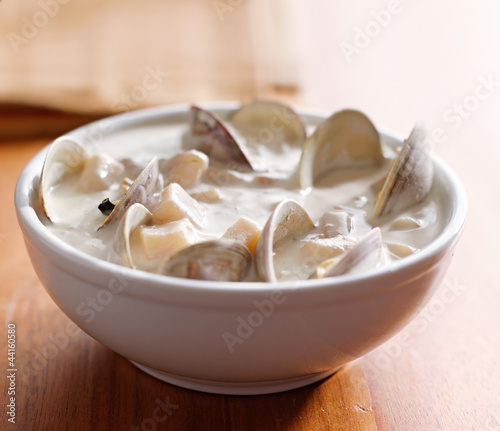 Photo: new england clam chowder closeup. new england clam chowder closeup.