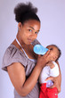 baby newborn with mother