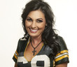 Photo: Beautiful happy smiling woman in American football top Beautiful happy smiling woman in American football top