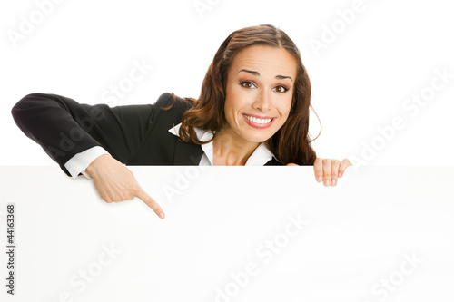 Photo: Businesswoman showing signboard, isolated Businesswoman showing signboard, isolated