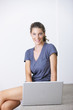 Attractive woman working on laptop