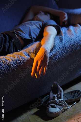 Photo: Smoking a joint at home Smoking a joint at home