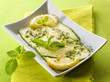 marinated zucchinis with lemon and mint leaves