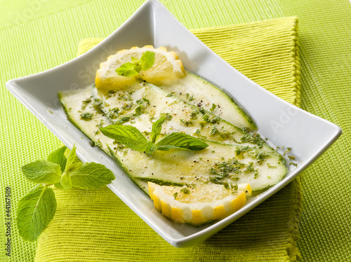 Photo: marinated zucchinis with lemon and mint leaves marinated zucchinis with lemon and mint leaves