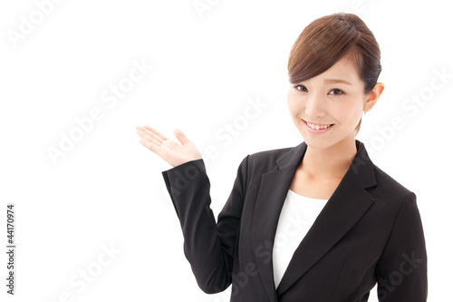 Photo: asian businesswoman showing asian businesswoman showing