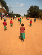 African Children go to church in the village Pomerini of  the Fr