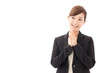 a young businesswoman smiling on white background