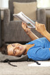 Young man is reading a book