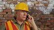 construction guy on a cell phone
