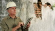Construction worker using a tablet pc