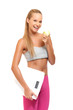 portrait of a sporty woman with apple