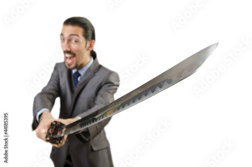 Photo: Businessman with sword on white Businessman with sword on white