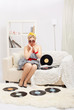 Photo: blonde woman with vinyls blonde woman with vinyls