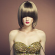 Photo: Portrait of beautiful sensual woman with elegant hairstyle Portrait of beautiful sensual woman with elegant hairstyle