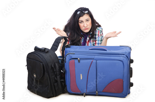 Photo: Girl preparing to travel for vacation Girl preparing to travel for vacation