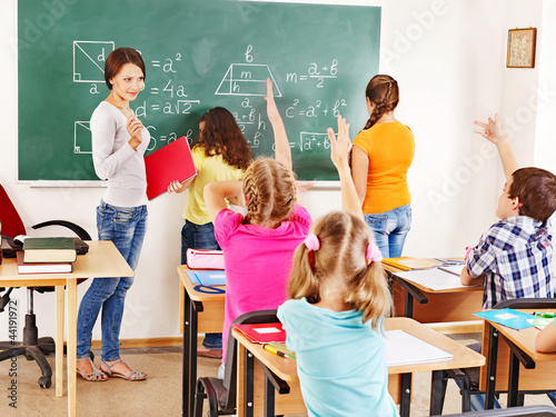Photo: School child with teacher. School child with teacher.