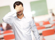 Portrait Of An Businessman Covering Eyes