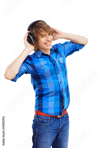 Photo: Happy smiling young man dancing Happy smiling young man dancing